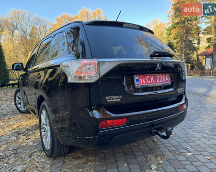 Чорний Міцубісі Аутлендер, об'ємом двигуна 2 л та пробігом 173 тис. км за 15299 $, фото 70 на Automoto.ua