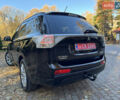 Чорний Міцубісі Аутлендер, об'ємом двигуна 2 л та пробігом 173 тис. км за 15299 $, фото 70 на Automoto.ua