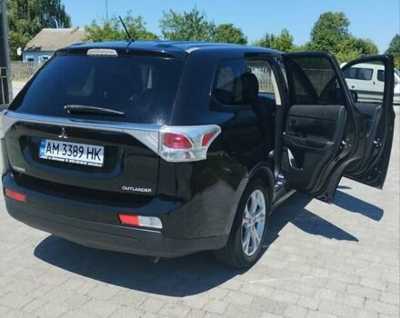 Черный Мицубиси Аутлендер, объемом двигателя 2.42 л и пробегом 148 тыс. км за 13000 $, фото 15 на Automoto.ua