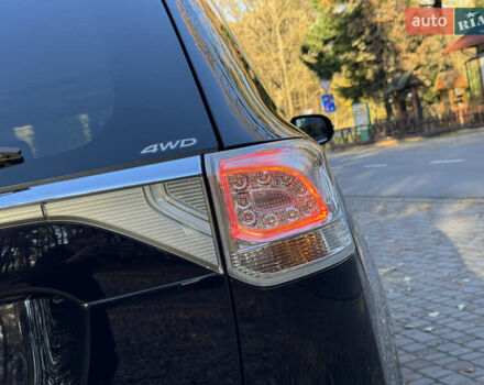 Чорний Міцубісі Аутлендер, об'ємом двигуна 2 л та пробігом 173 тис. км за 15299 $, фото 51 на Automoto.ua