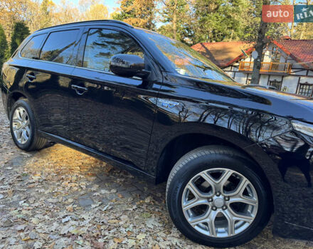 Чорний Міцубісі Аутлендер, об'ємом двигуна 2 л та пробігом 173 тис. км за 15299 $, фото 13 на Automoto.ua