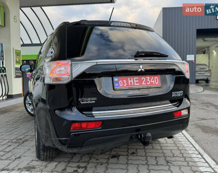 Чорний Міцубісі Аутлендер, об'ємом двигуна 2 л та пробігом 157 тис. км за 15299 $, фото 58 на Automoto.ua