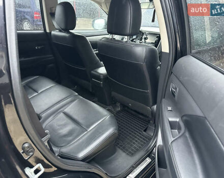 Черный Мицубиси Аутлендер, объемом двигателя 2 л и пробегом 223 тыс. км за 13400 $, фото 11 на Automoto.ua