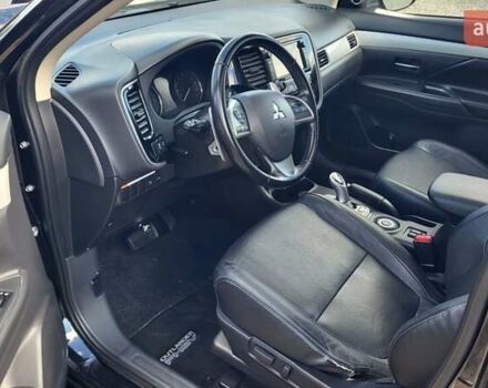 Чорний Міцубісі Аутлендер, об'ємом двигуна 2 л та пробігом 237 тис. км за 13800 $, фото 13 на Automoto.ua