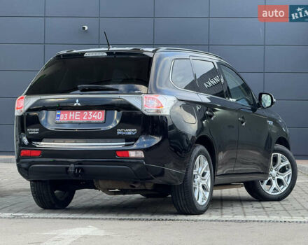 Чорний Міцубісі Аутлендер, об'ємом двигуна 2 л та пробігом 157 тис. км за 15299 $, фото 37 на Automoto.ua