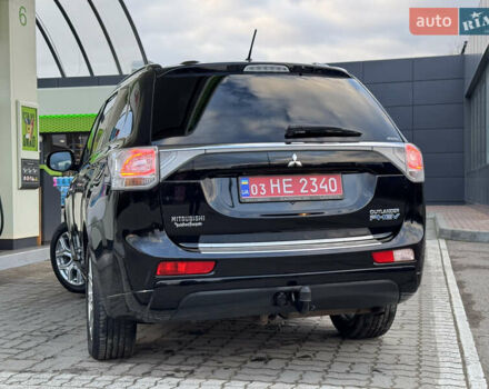 Чорний Міцубісі Аутлендер, об'ємом двигуна 2 л та пробігом 157 тис. км за 15299 $, фото 56 на Automoto.ua