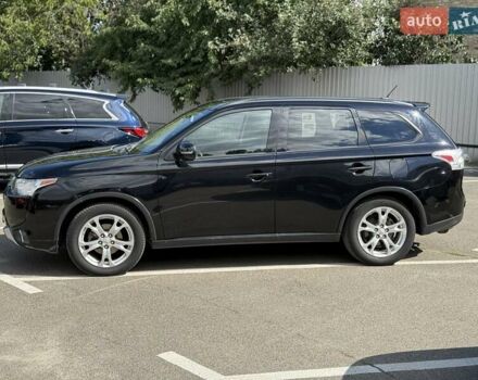 Черный Мицубиси Аутлендер, объемом двигателя 2.4 л и пробегом 231 тыс. км за 12600 $, фото 5 на Automoto.ua