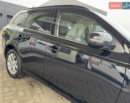 Чорний Міцубісі Аутлендер, об'ємом двигуна 2 л та пробігом 157 тис. км за 15299 $, фото 16 на Automoto.ua