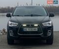 Чорний Міцубісі Аутлендер, об'ємом двигуна 2 л та пробігом 250 тис. км за 10800 $, фото 5 на Automoto.ua