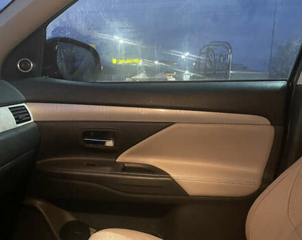 Черный Мицубиси Аутлендер, объемом двигателя 2 л и пробегом 206 тыс. км за 14500 $, фото 11 на Automoto.ua