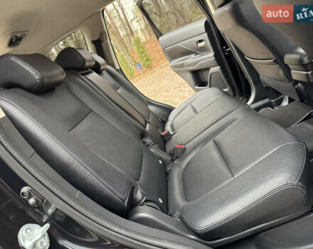 Черный Мицубиси Аутлендер, объемом двигателя 2 л и пробегом 173 тыс. км за 15299 $, фото 104 на Automoto.ua