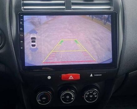 Чорний Міцубісі Аутлендер, об'ємом двигуна 2 л та пробігом 250 тис. км за 10800 $, фото 14 на Automoto.ua