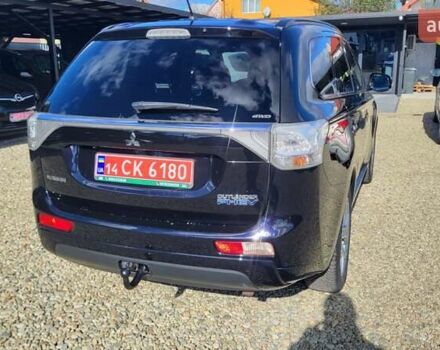 Чорний Міцубісі Аутлендер, об'ємом двигуна 2 л та пробігом 237 тис. км за 13800 $, фото 5 на Automoto.ua