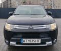Чорний Міцубісі Аутлендер, об'ємом двигуна 2.4 л та пробігом 224 тис. км за 12000 $, фото 1 на Automoto.ua