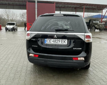 Чорний Міцубісі Аутлендер, об'ємом двигуна 2.4 л та пробігом 150 тис. км за 12200 $, фото 2 на Automoto.ua