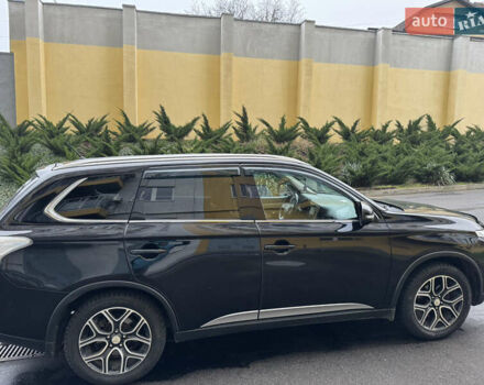 Черный Мицубиси Аутлендер, объемом двигателя 2.27 л и пробегом 244 тыс. км за 14000 $, фото 4 на Automoto.ua