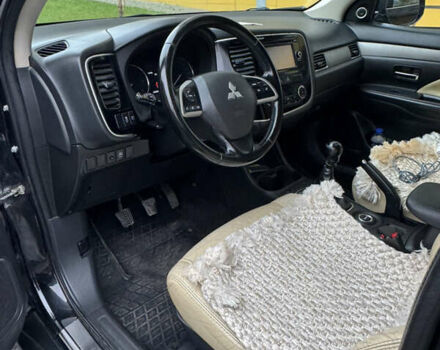 Черный Мицубиси Аутлендер, объемом двигателя 2.27 л и пробегом 244 тыс. км за 14000 $, фото 12 на Automoto.ua