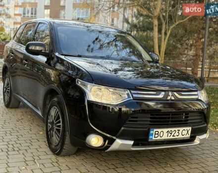 Черный Мицубиси Аутлендер, объемом двигателя 2.4 л и пробегом 270 тыс. км за 12500 $, фото 6 на Automoto.ua