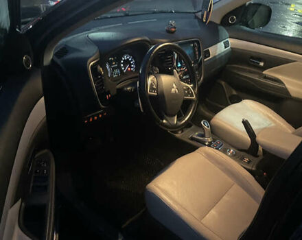 Черный Мицубиси Аутлендер, объемом двигателя 2 л и пробегом 206 тыс. км за 14500 $, фото 12 на Automoto.ua