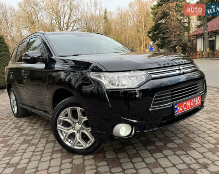 Черный Мицубиси Аутлендер, объемом двигателя 2 л и пробегом 173 тыс. км за 15299 $, фото 5 на Automoto.ua