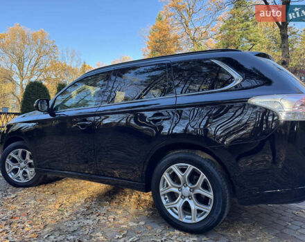 Чорний Міцубісі Аутлендер, об'ємом двигуна 2 л та пробігом 173 тис. км за 15299 $, фото 72 на Automoto.ua