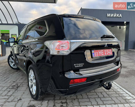 Чорний Міцубісі Аутлендер, об'ємом двигуна 2 л та пробігом 157 тис. км за 15299 $, фото 61 на Automoto.ua