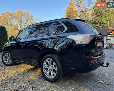 Чорний Міцубісі Аутлендер, об'ємом двигуна 2 л та пробігом 173 тис. км за 15299 $, фото 71 на Automoto.ua