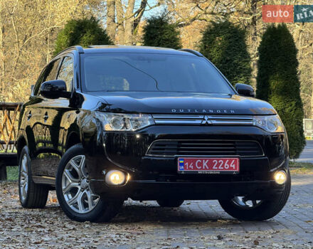 Чорний Міцубісі Аутлендер, об'ємом двигуна 2 л та пробігом 173 тис. км за 15299 $, фото 2 на Automoto.ua