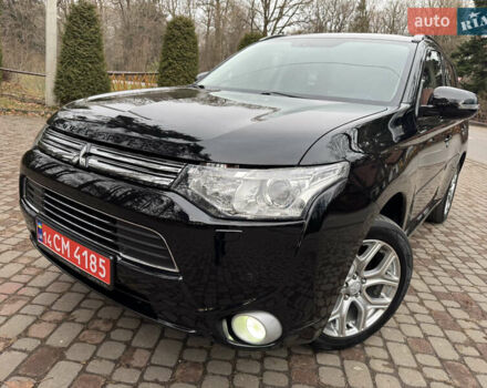 Черный Мицубиси Аутлендер, объемом двигателя 2 л и пробегом 173 тыс. км за 15299 $, фото 26 на Automoto.ua