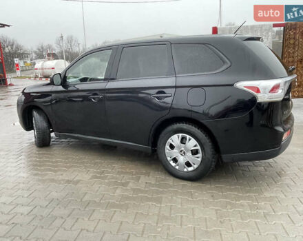 Чорний Міцубісі Аутлендер, об'ємом двигуна 2.4 л та пробігом 150 тис. км за 12200 $, фото 4 на Automoto.ua