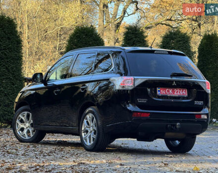 Чорний Міцубісі Аутлендер, об'ємом двигуна 2 л та пробігом 173 тис. км за 15299 $, фото 59 на Automoto.ua