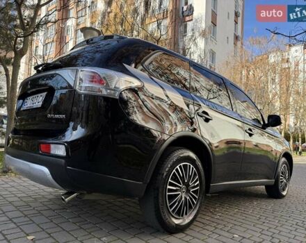 Черный Мицубиси Аутлендер, объемом двигателя 2.4 л и пробегом 270 тыс. км за 12500 $, фото 11 на Automoto.ua