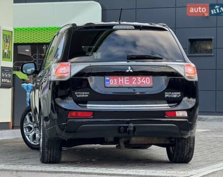 Чорний Міцубісі Аутлендер, об'ємом двигуна 2 л та пробігом 157 тис. км за 15299 $, фото 54 на Automoto.ua