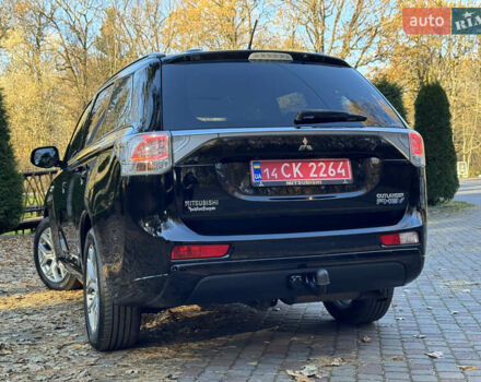Чорний Міцубісі Аутлендер, об'ємом двигуна 2 л та пробігом 173 тис. км за 15299 $, фото 63 на Automoto.ua