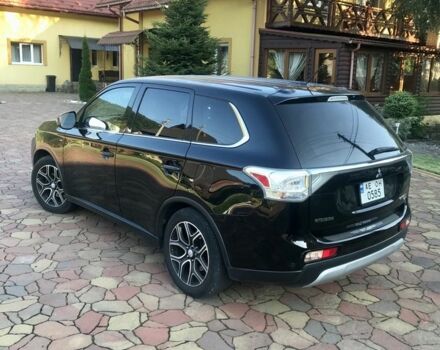 Черный Мицубиси Аутлендер, объемом двигателя 3 л и пробегом 250 тыс. км за 13500 $, фото 3 на Automoto.ua