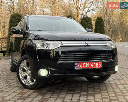 Черный Мицубиси Аутлендер, объемом двигателя 2 л и пробегом 173 тыс. км за 15299 $, фото 4 на Automoto.ua