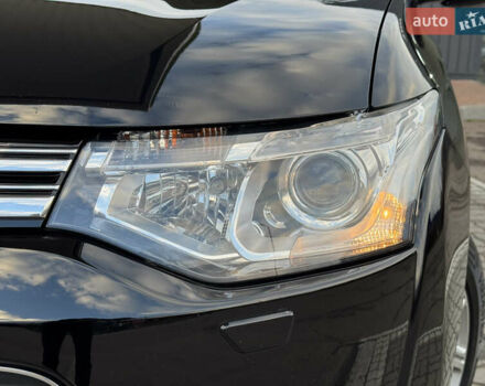 Чорний Міцубісі Аутлендер, об'ємом двигуна 2 л та пробігом 157 тис. км за 15299 $, фото 26 на Automoto.ua