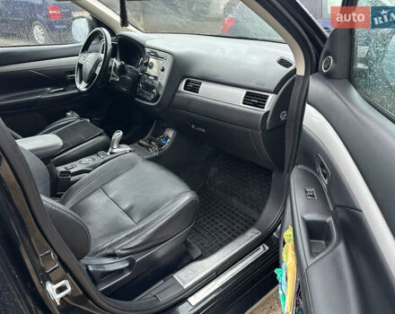 Черный Мицубиси Аутлендер, объемом двигателя 2 л и пробегом 223 тыс. км за 13400 $, фото 12 на Automoto.ua