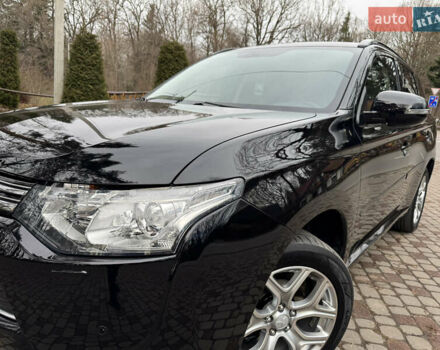 Черный Мицубиси Аутлендер, объемом двигателя 2 л и пробегом 173 тыс. км за 15299 $, фото 28 на Automoto.ua