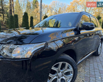 Чорний Міцубісі Аутлендер, об'ємом двигуна 2 л та пробігом 173 тис. км за 15299 $, фото 35 на Automoto.ua