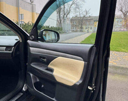 Черный Мицубиси Аутлендер, объемом двигателя 2.27 л и пробегом 244 тыс. км за 14000 $, фото 19 на Automoto.ua