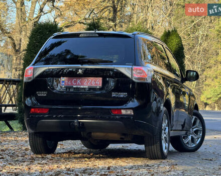 Чорний Міцубісі Аутлендер, об'ємом двигуна 2 л та пробігом 173 тис. км за 15299 $, фото 45 на Automoto.ua