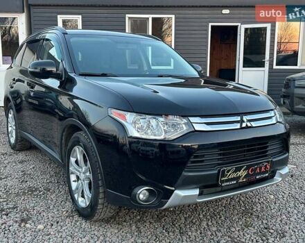 Чорний Міцубісі Аутлендер, об'ємом двигуна 2.4 л та пробігом 199 тис. км за 12800 $, фото 3 на Automoto.ua