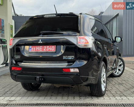 Чорний Міцубісі Аутлендер, об'ємом двигуна 2 л та пробігом 157 тис. км за 15299 $, фото 41 на Automoto.ua