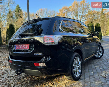 Чорний Міцубісі Аутлендер, об'ємом двигуна 2 л та пробігом 173 тис. км за 15299 $, фото 48 на Automoto.ua