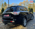 Чорний Міцубісі Аутлендер, об'ємом двигуна 2 л та пробігом 173 тис. км за 15299 $, фото 48 на Automoto.ua