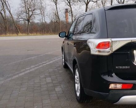 Чорний Міцубісі Аутлендер, об'ємом двигуна 2.4 л та пробігом 224 тис. км за 12000 $, фото 3 на Automoto.ua
