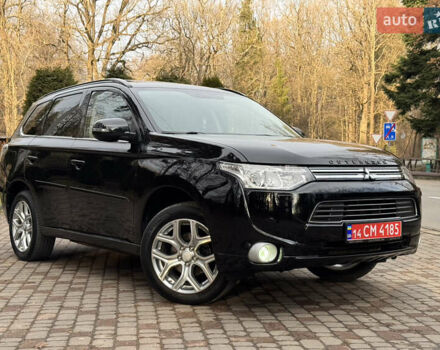 Черный Мицубиси Аутлендер, объемом двигателя 2 л и пробегом 173 тыс. км за 15299 $, фото 3 на Automoto.ua