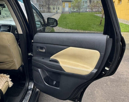 Черный Мицубиси Аутлендер, объемом двигателя 2.27 л и пробегом 244 тыс. км за 14000 $, фото 14 на Automoto.ua