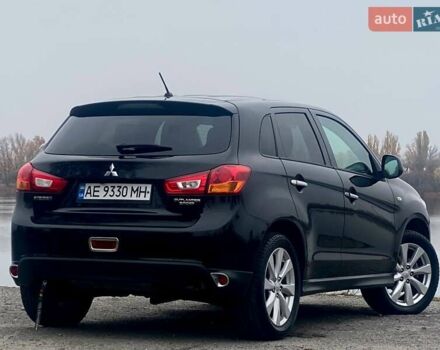 Чорний Міцубісі Аутлендер, об'ємом двигуна 2 л та пробігом 250 тис. км за 10800 $, фото 10 на Automoto.ua